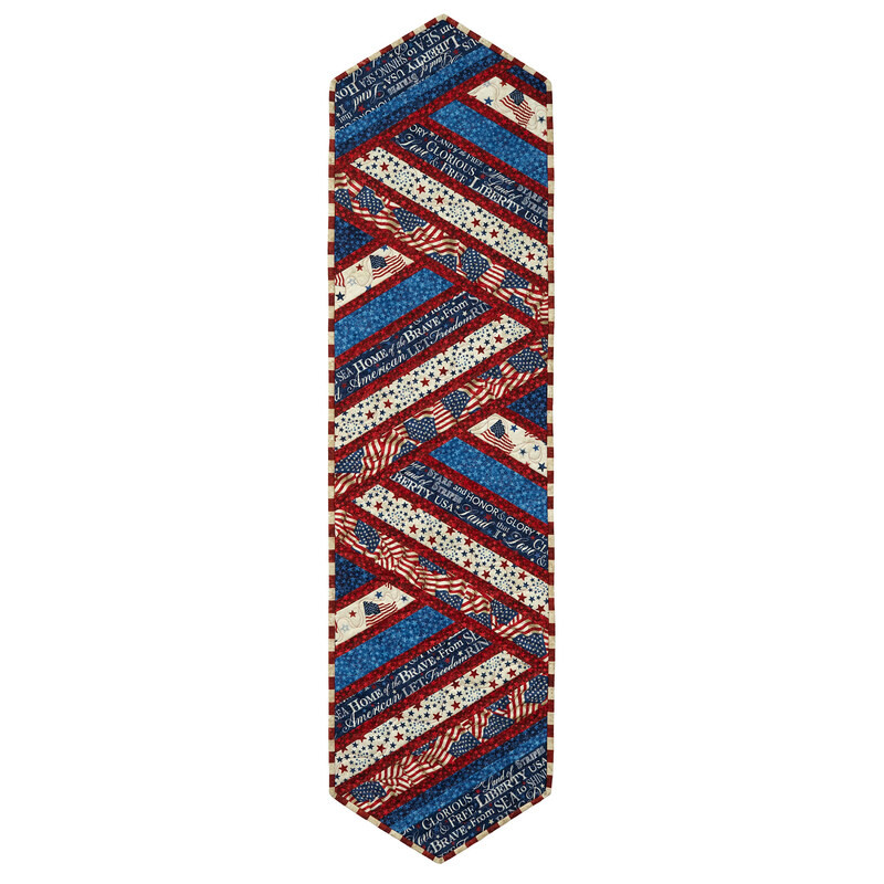 The completed Greased Lightning Table Runner in red, white, and blue fabrics from the Stars & Stripes 14 collection by Northcott Fabrics, isolated on a white background.