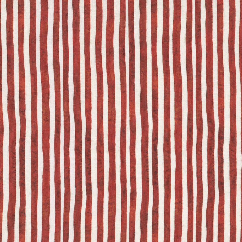 White fabric with a classic pattern of irregular red stripes