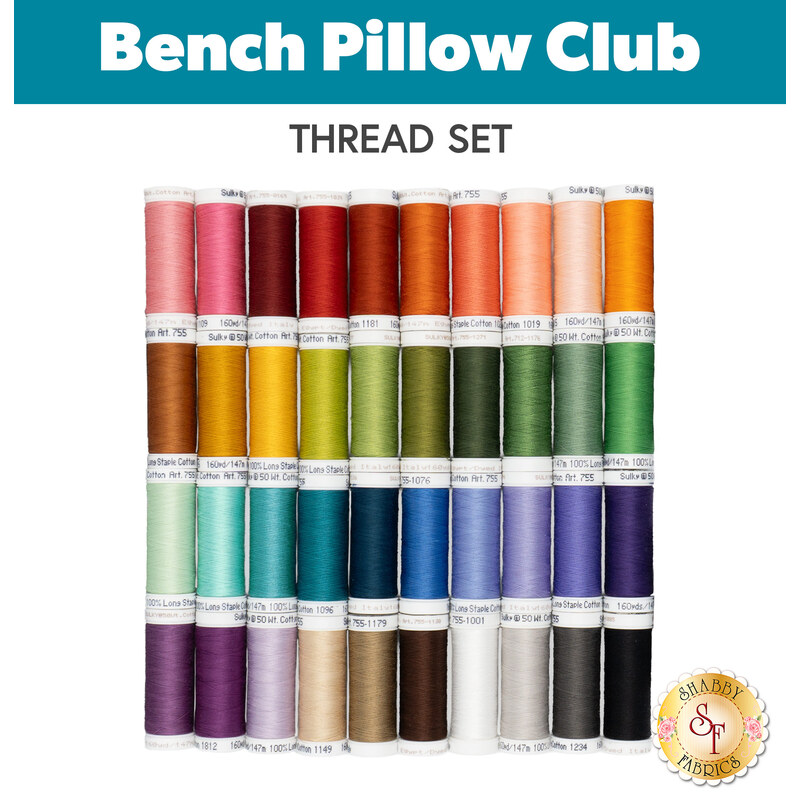 40 piece thread set for the Bench Pillow Club, showing four rows of ten spools organized in rainbow order.