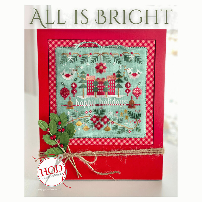 Front image of the All Is Bright pattern featuring a framed finished project.