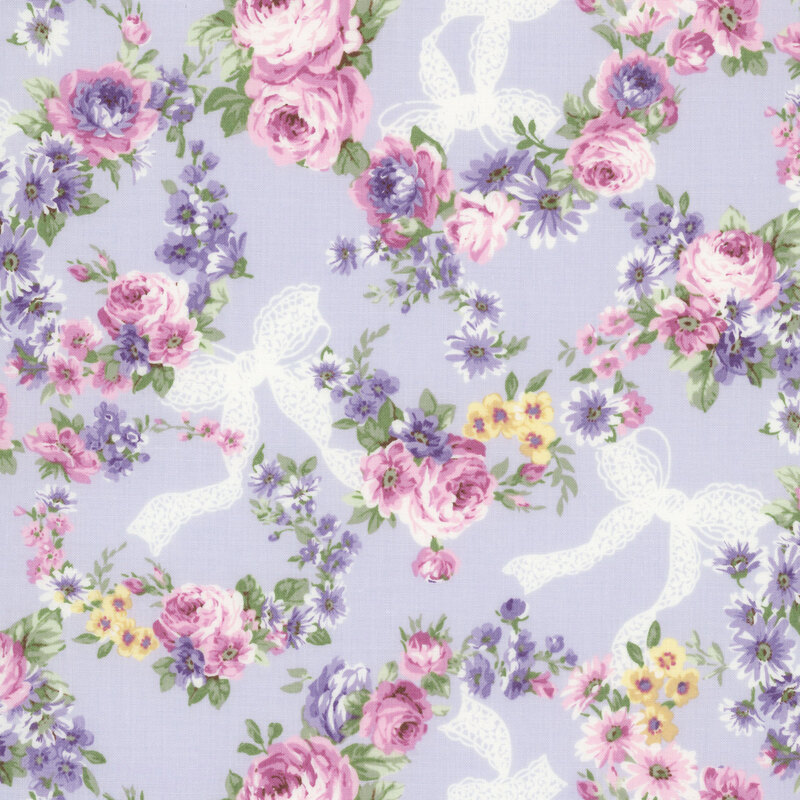 Lavender fabric with white bows and wreaths of florals and mauve-pink roses.
