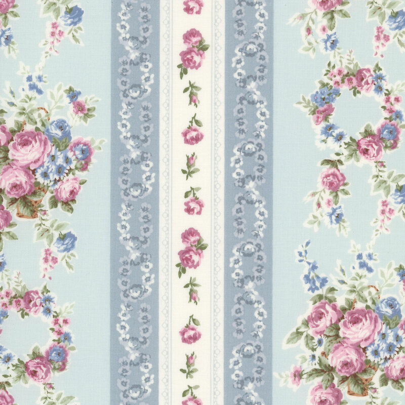 Striped fabric with ice blue and cream stripes layered with pink roses, rosebuds, and floral bouquets.