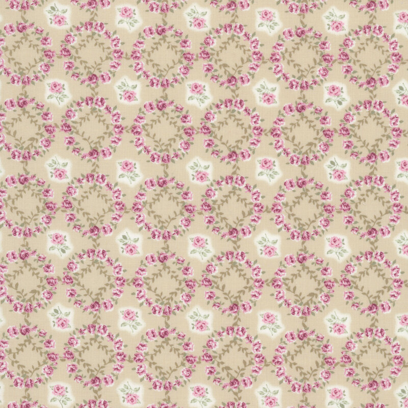 Tan fabric layered with a grid of mauve-pink rose wreaths and roses.