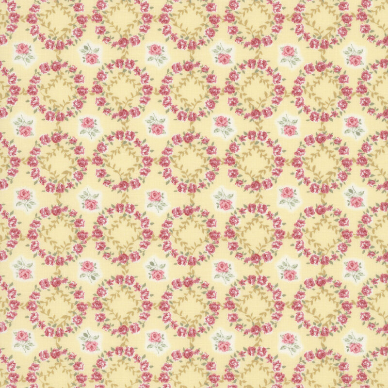 Soft yellow fabric layered with a grid of mauve-pink rose wreaths and roses.