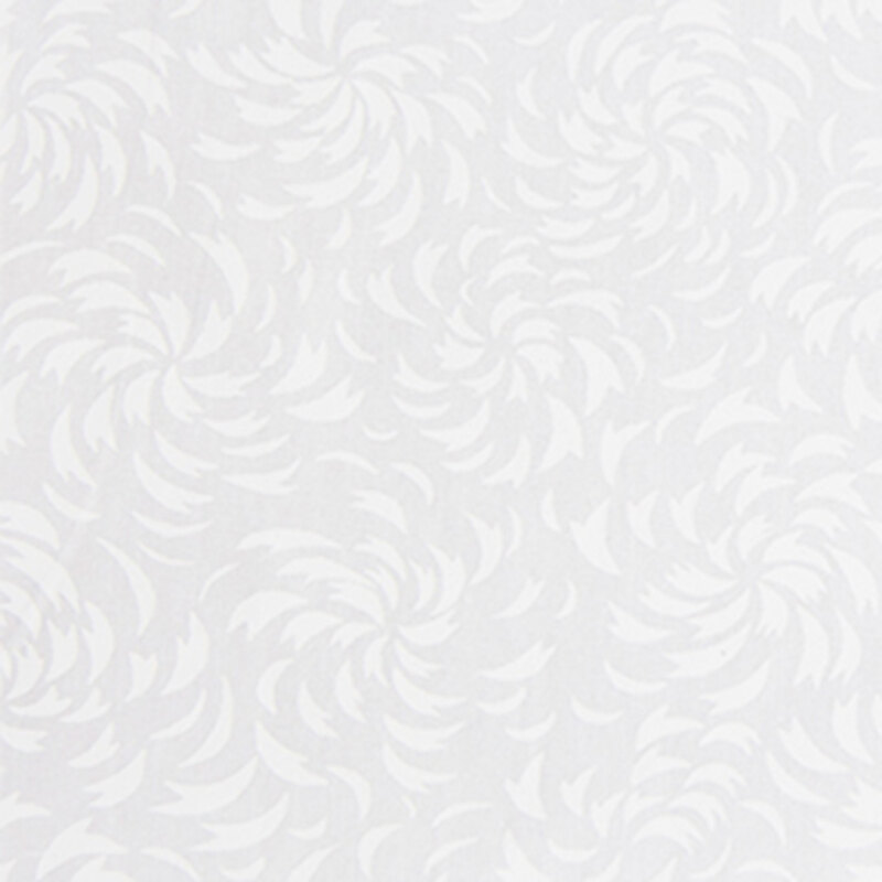 White-on-white batik with a swirling starburst pattern.