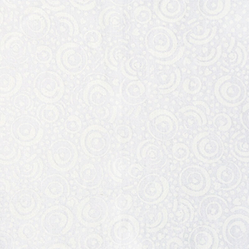 White-on-white batik with a swirling and spiraling pattern.