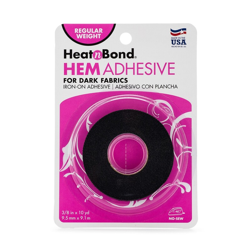Pink package of the Heat n Bond Hem Adhesive Regular Weight tape for dark fabrics.