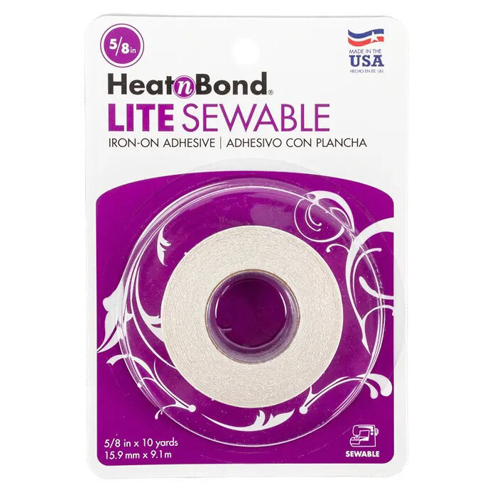 The Heat n Bond Lite Sewable adhesive tape, featuring a white roll of tape in its purple packaging.