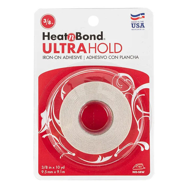 The Heat n Bond Ultrahold adhesive tape, featuring a white roll of tape in its red packaging.