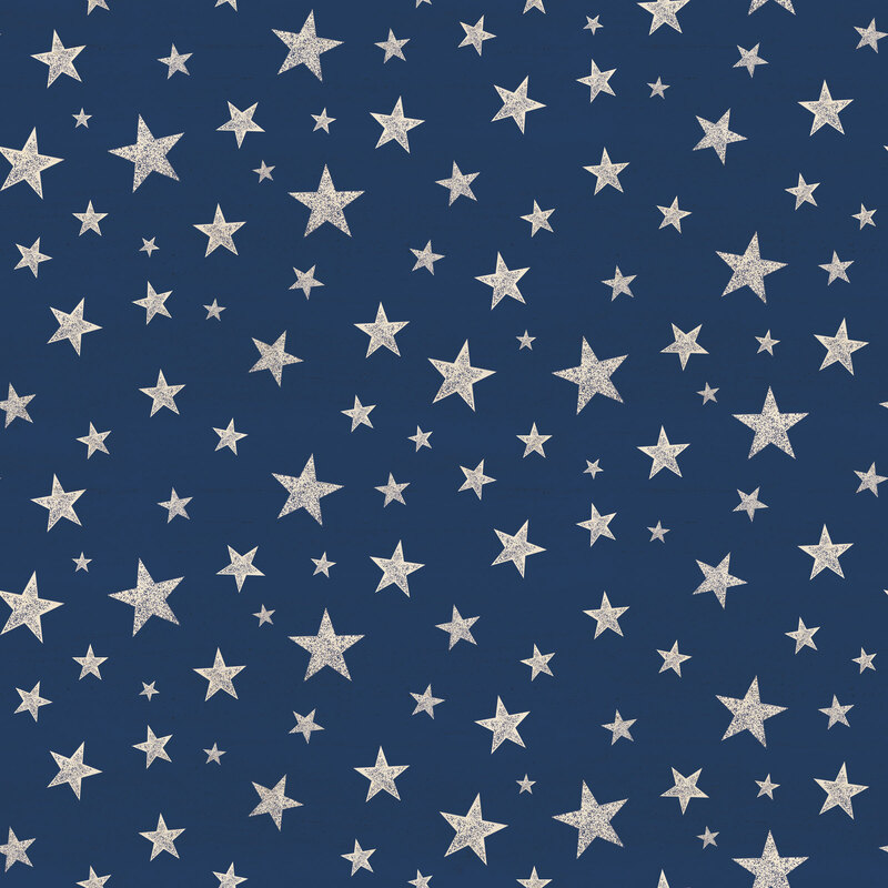 Blue fabric tossed with textured cream stars of varying sizes.