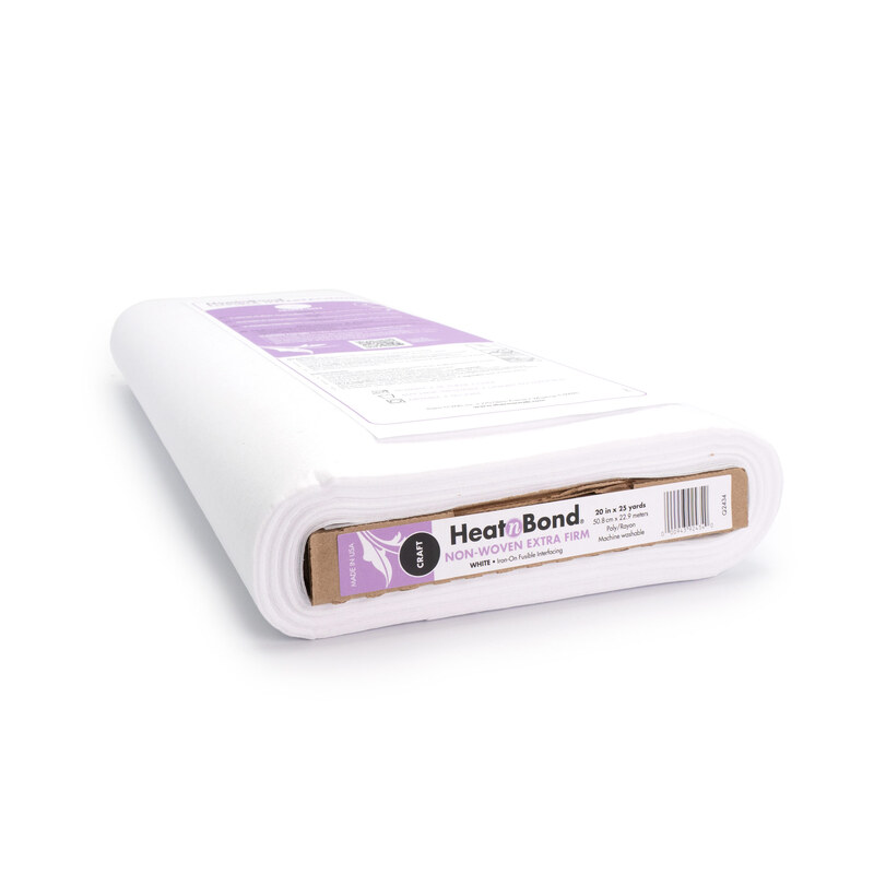 A bolt of the Heat n Bond Iron-on Adhesive - Non-Woven Extra Firm Fusible, isolated on a white background.