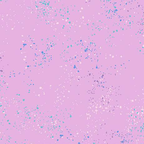 Light mauve fabric with natural splatters of purple, blue, and light pink.