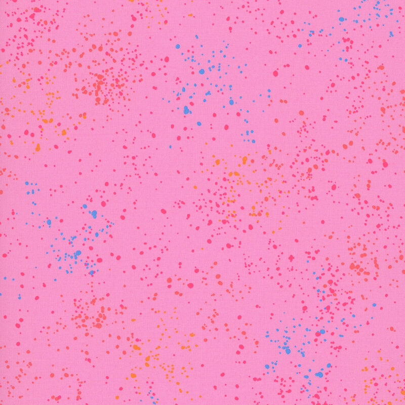 Bright pink fabric with natural splatters of pink, orange, and blue.