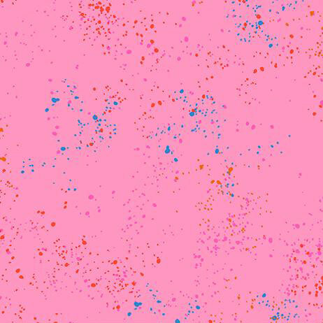 Bright pink fabric with natural splatters of pink, orange, and blue.
