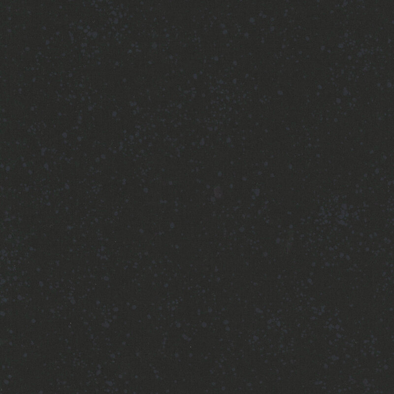 Onyx fabric splattered with varying shades of gray paint.