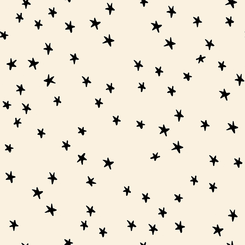 Cream fabric with black stars.