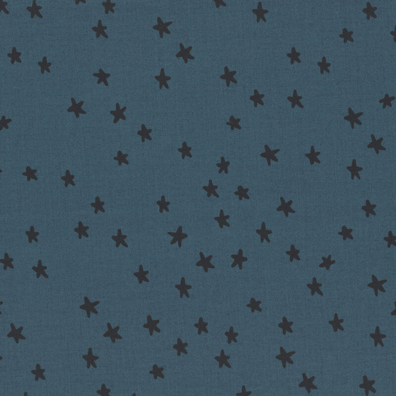 Dark denim blue fabric with scattered black stars.