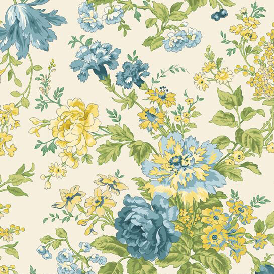 Large blue and yellow floral sets laid on top of a cream fabric.