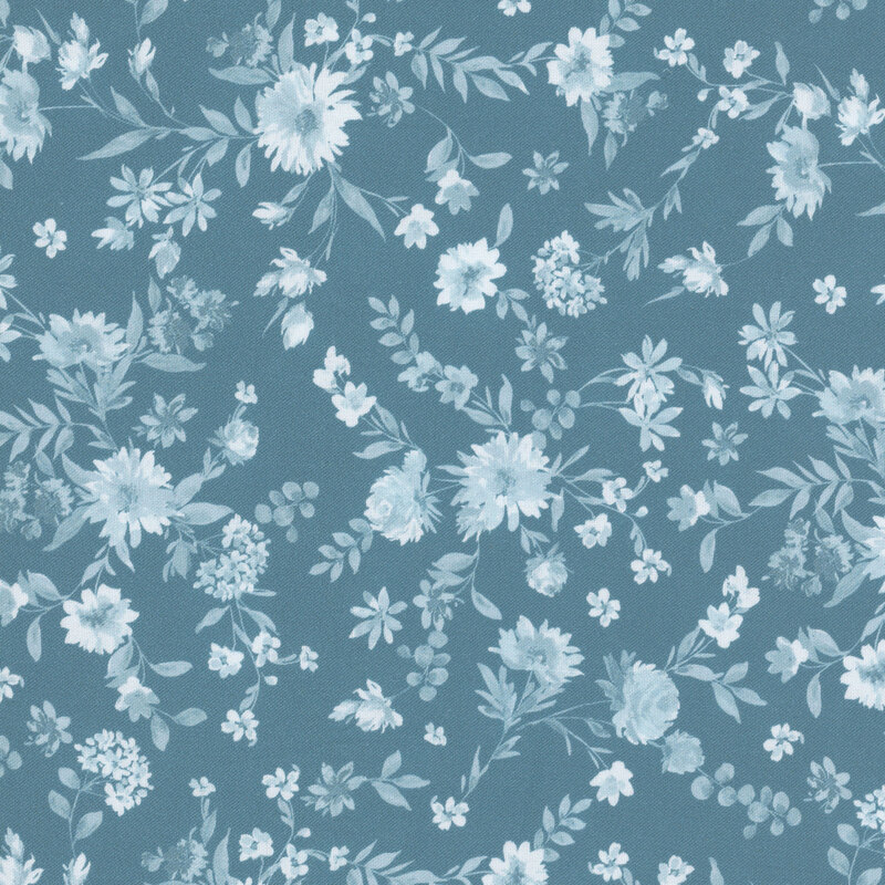 Scattered light blue florals on a dark teal fabric.