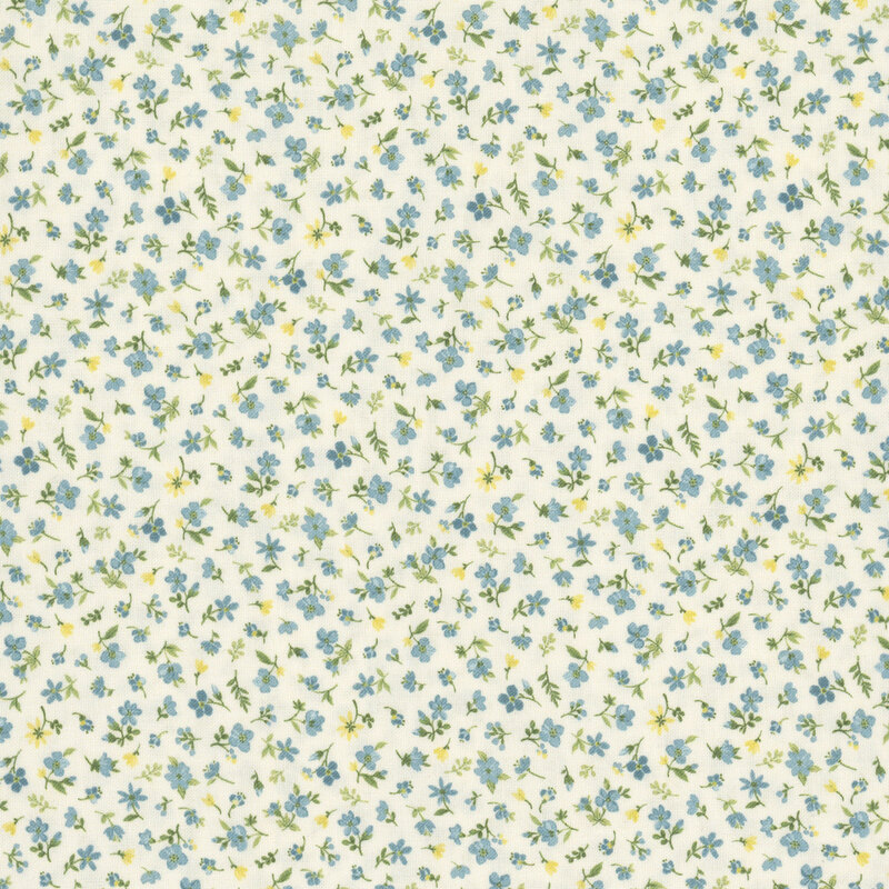 Small blue and yellow florals tossed onto a cream fabric.