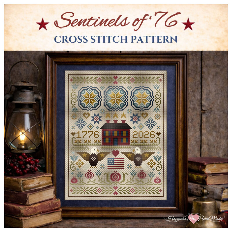 Image of the completed cross stitch project, framed and staged with decor.