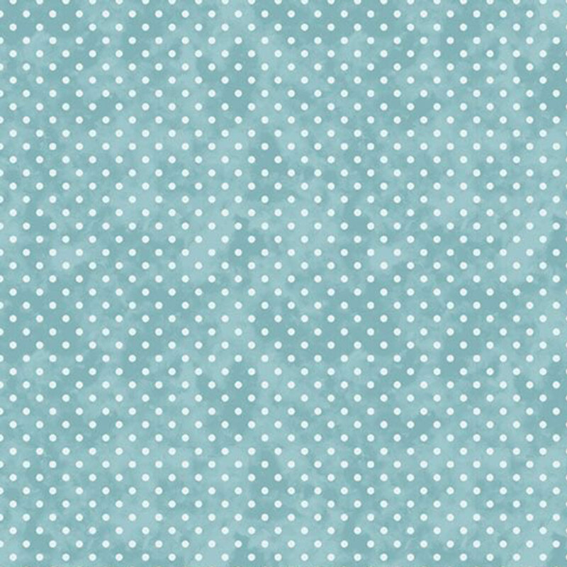 White polka dots on top of a textured aqua fabric.