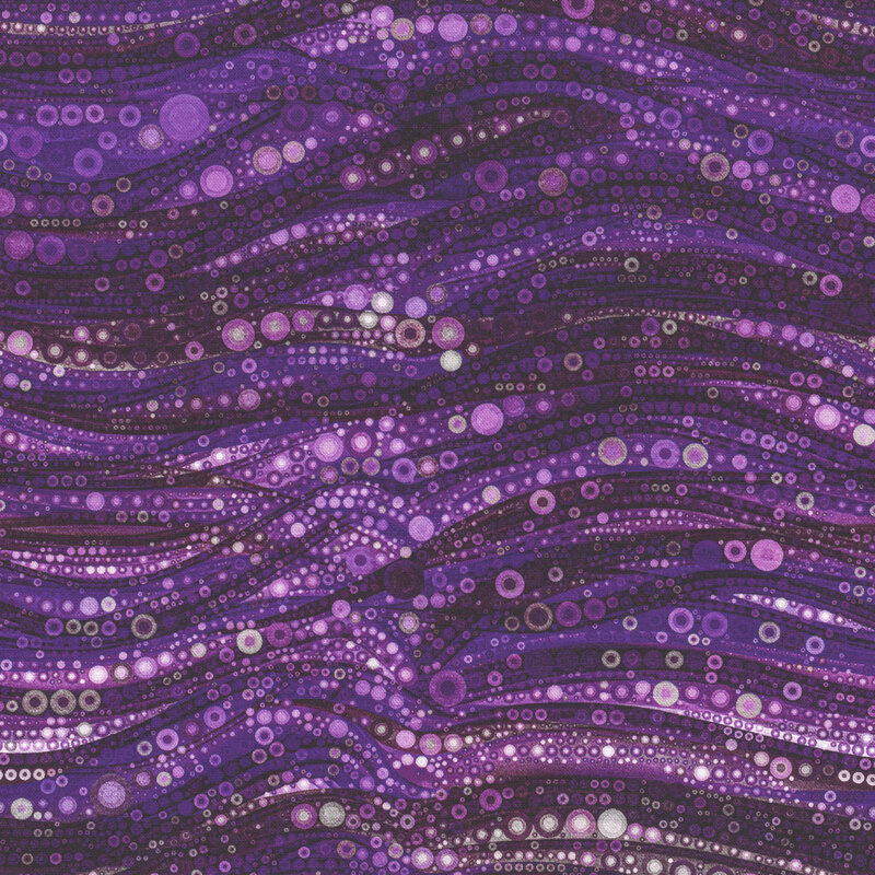 fabric featuring wavy dotted lines in varying shades of purple