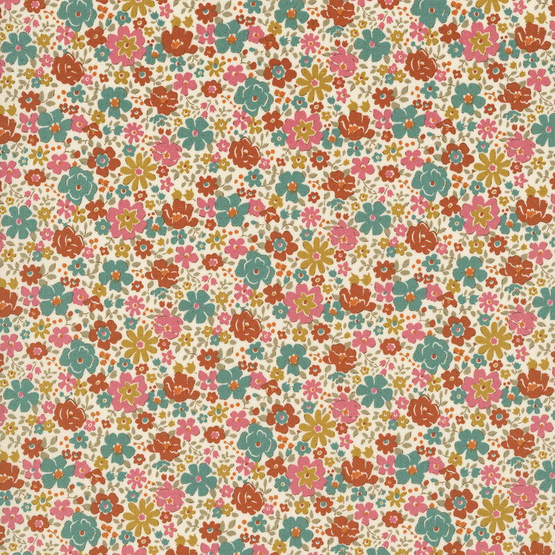 This cream fabric features packed florals in lovely shades of pink, teal, rust, and ochre. 