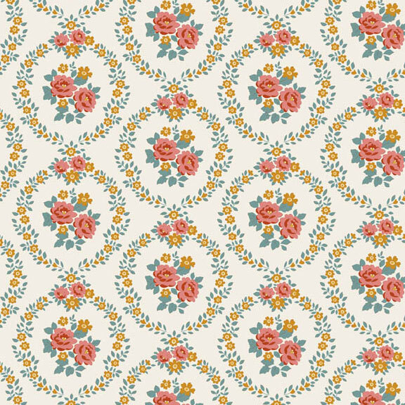 This cream fabric features rust and ocher floral wreaths framing centerpieces. 