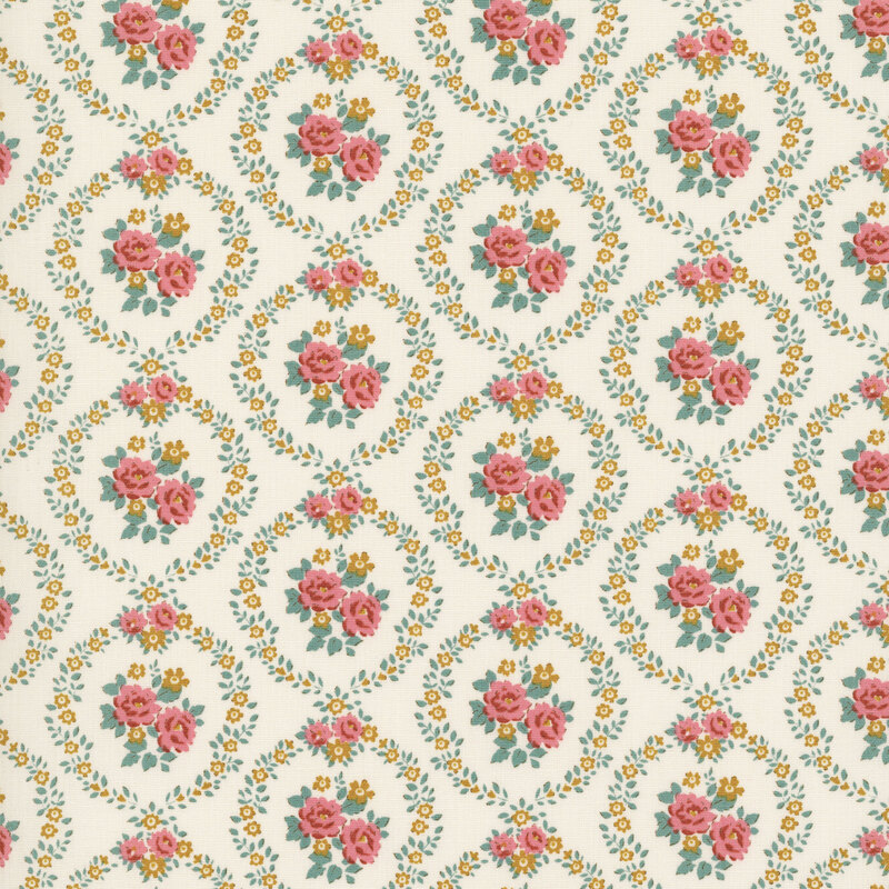 This cream fabric features rust and ocher floral wreaths framing centerpieces. 