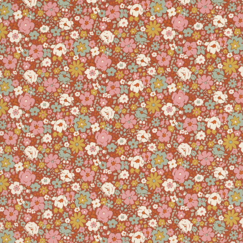 This rust orange fabric features packed florals in lovely shades of pink, teal, white, and ochre. 
