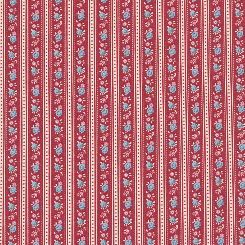 This burgundy and white striped fabric features rows of blue and pink flowers. 