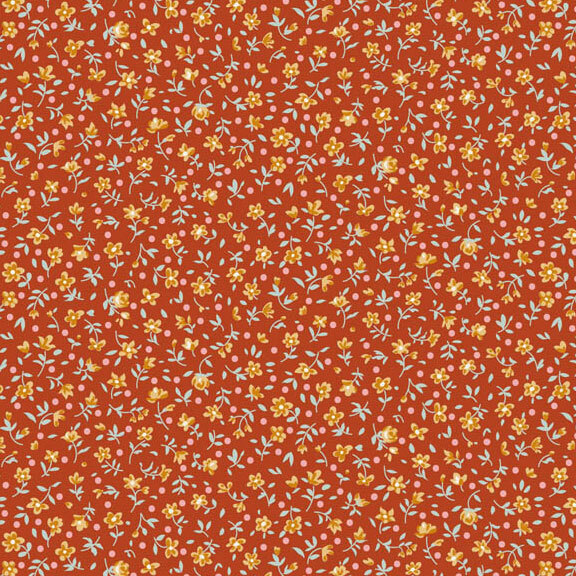 This rust orange fabric features a ditsy print of ocher flowers with pink dots.