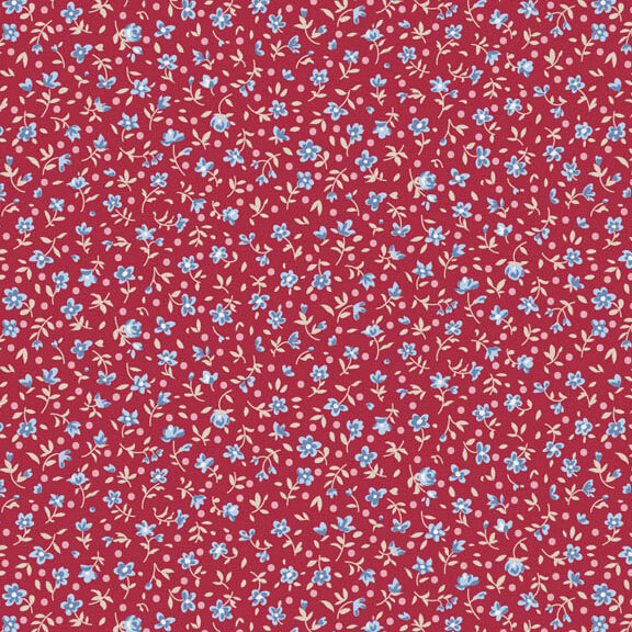 This burgundy fabric features a ditsy print of blue flowers with pink dots.
