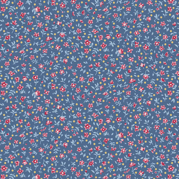 This blue fabric features a ditsy print of burgundy flowers with ocher dots.