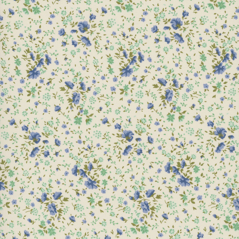 scattered pattern of blue and teal floral blooms with green leaves on a cream background.