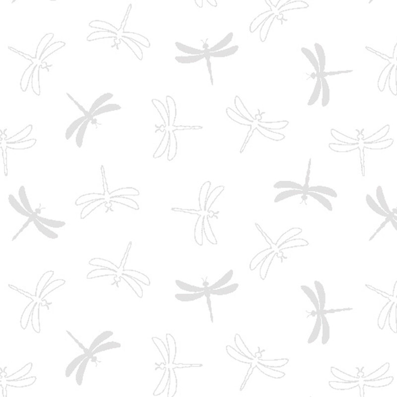 A white on white fabric with dragonflies