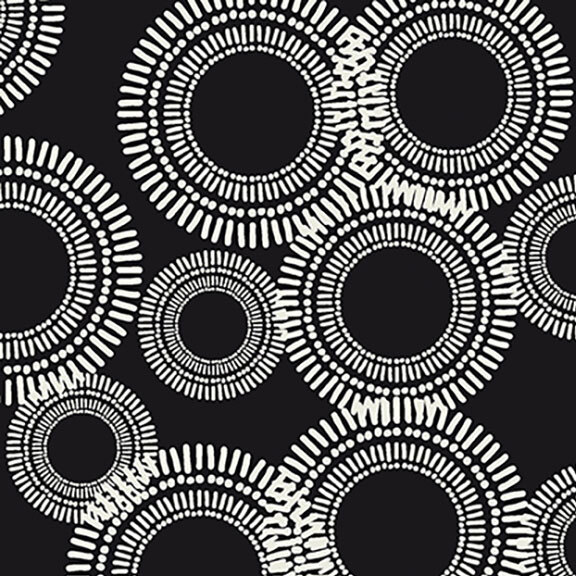 Blooming white circles of varying sizes scattered across an onyx black fabric. 