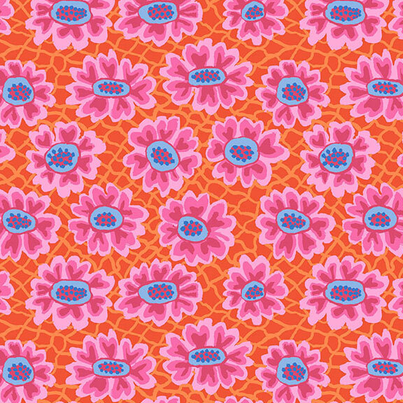 Intricate red-orange fabric with a tonal net design over the top, layered with bright, purple, pink, and blue stylized florals. 