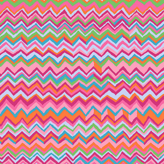 Warm, pink-toned fabric with rows of layered multicolored zig-zags.