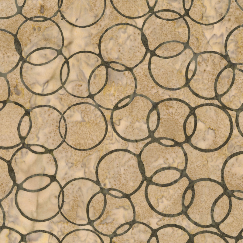 Taupe batik with gray circles over the top.
