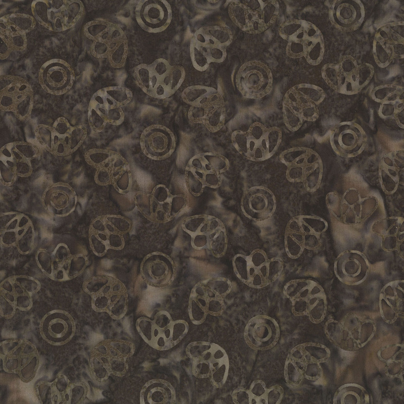 Dark brown batik with taupe stylized circles and leaf motifs.
