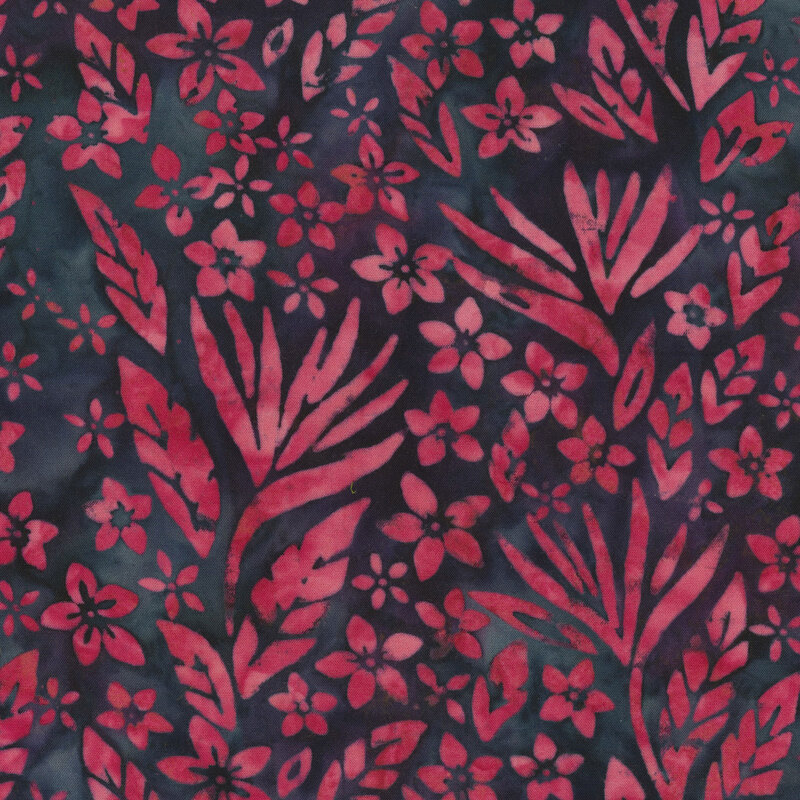 Pink leaves and florals over a deep dark blue batik.