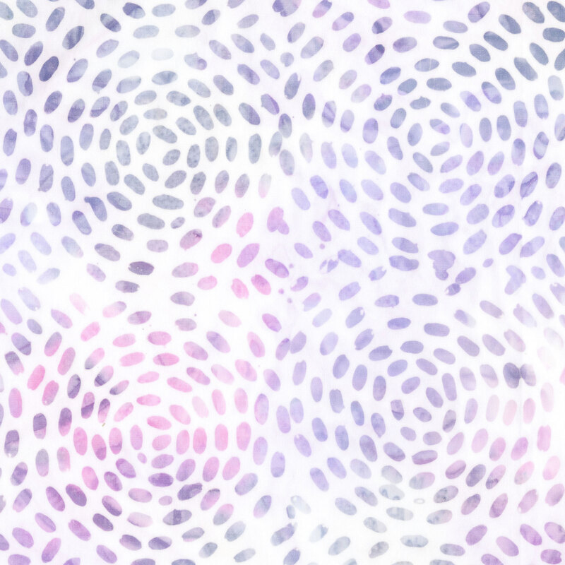 white fabric with a mottled circular pattern of scattered dots in hues of lilac, lavender, and violet 