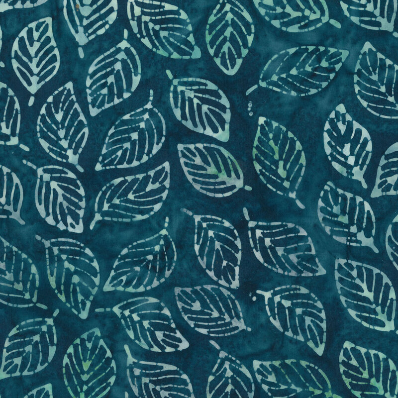 dark teal mottled fabric featuring a tropical leaf print in shades of aqua and ice blue