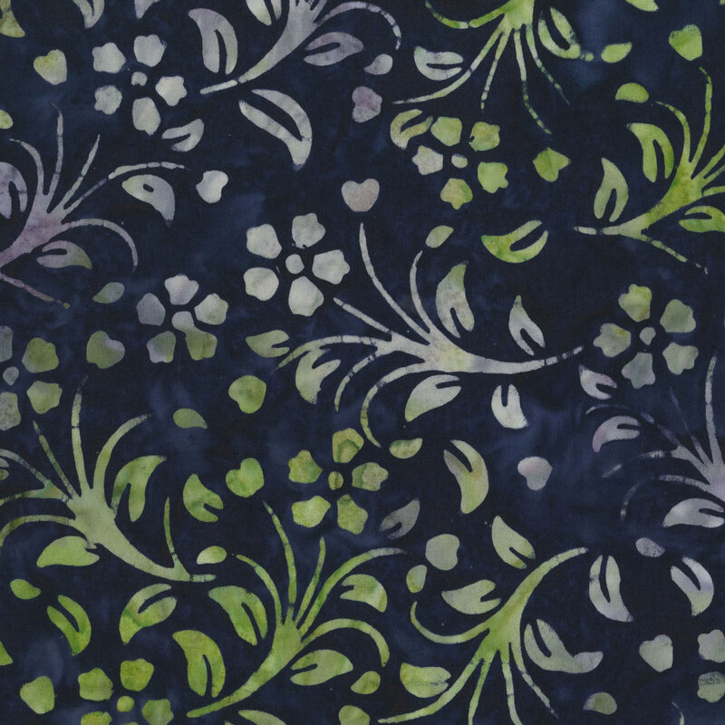 mottled floral sprigs in hues of lime and ivory on a dark indigo background.