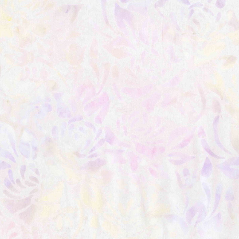 Cream batik overlayed with yellow, pink, and purple florals.