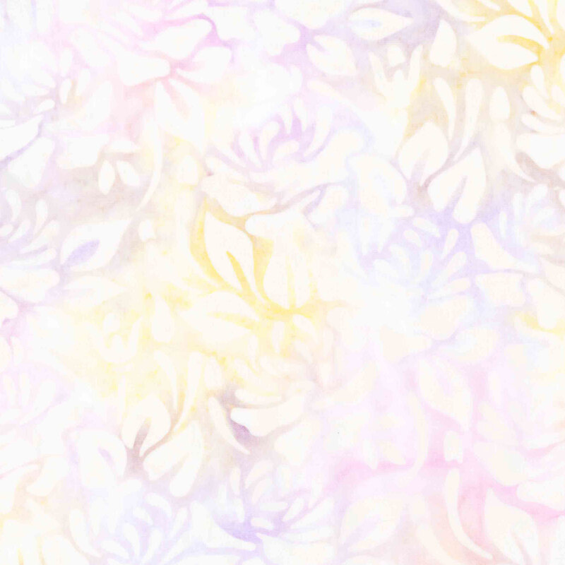 Purple, pink, and yellow batik overlayed with white florals.