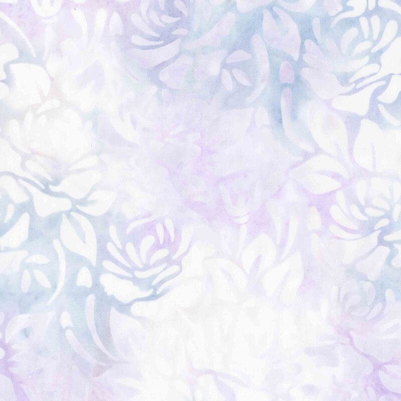 Purple and blue batik overlayed with white florals.