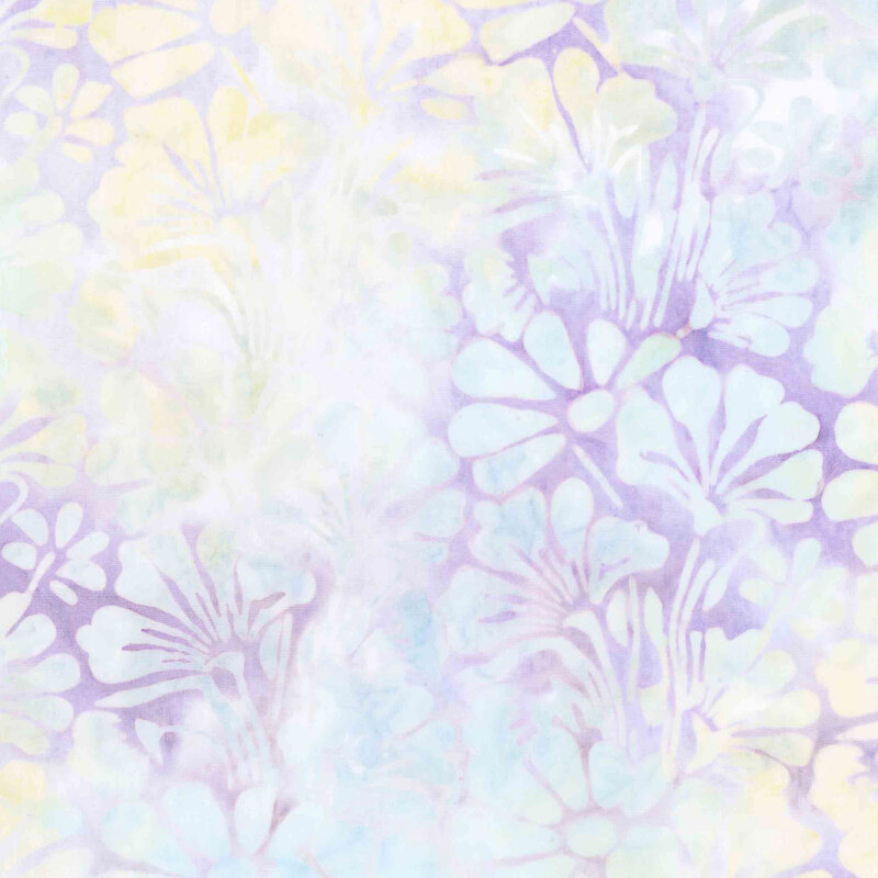 Wisteria and white batik with yellow and light blue overlayed florals.